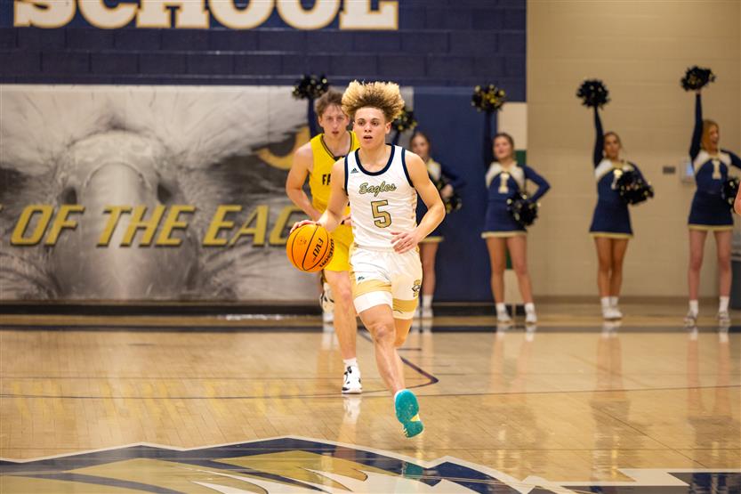 Students play basketball